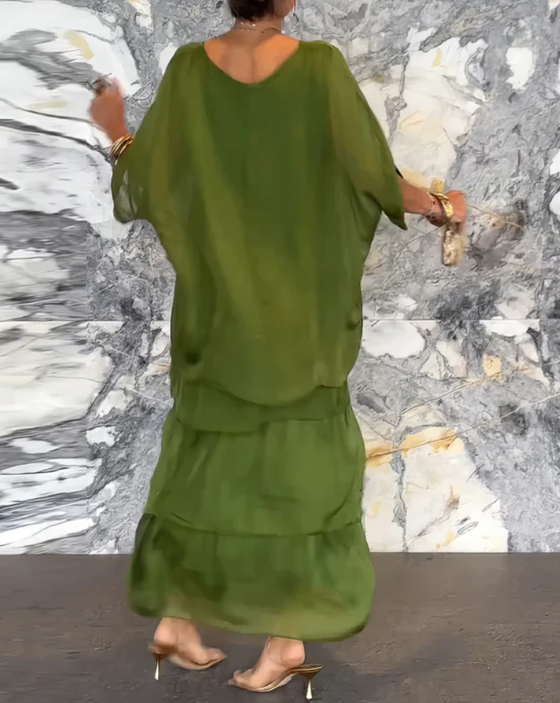 Svanstrom l Elegant Flödande Maxi Klänning