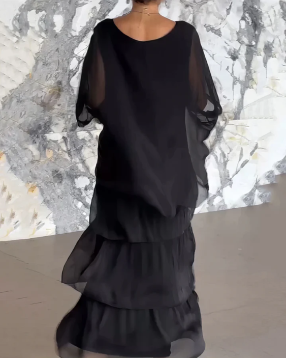 Svanstrom l Elegant Flödande Maxi Klänning